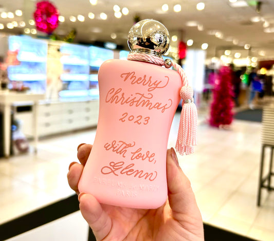 Live engraving for fragrances at holiday event in Atlanta Georgia by Macie Kendall Co