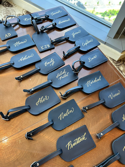 client gift ideas calligraphy on leather luggage tags
